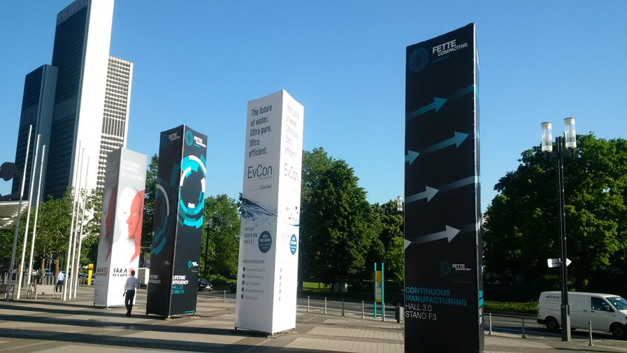 Oktavo advertising towers at the entrance of Messe Frankfurt