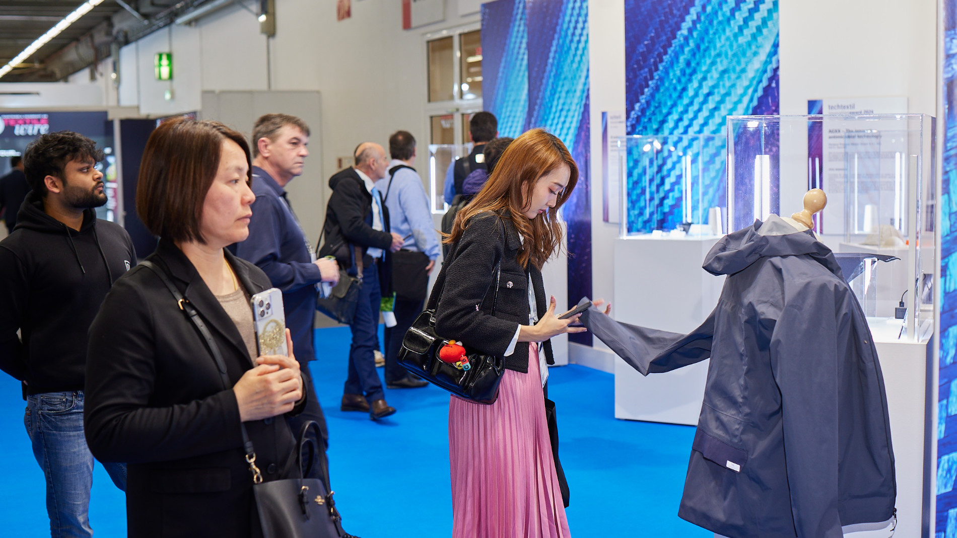 Visitors looking at products